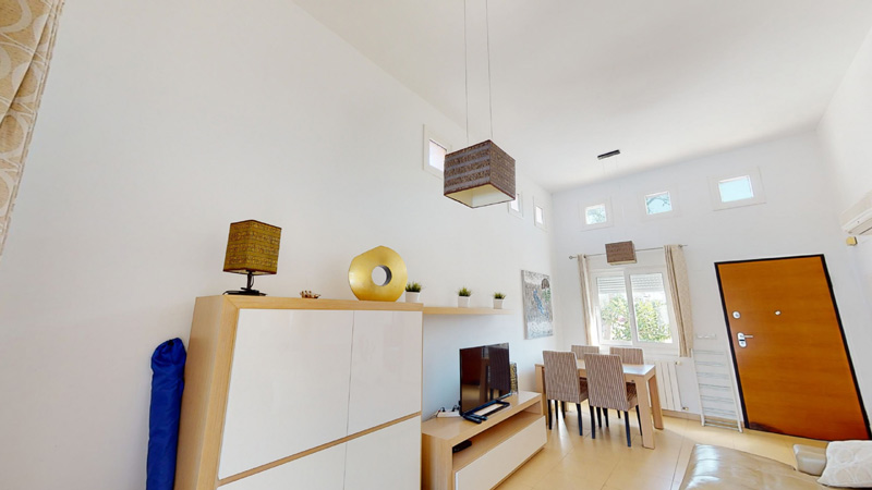 Bright Living Space with High Ceiling